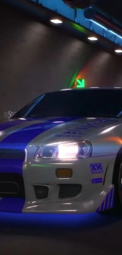 Silver sports car with blue stripes in a neon-lit tunnel.