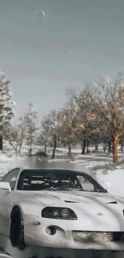 White sports car in snowy winter landscape with trees.