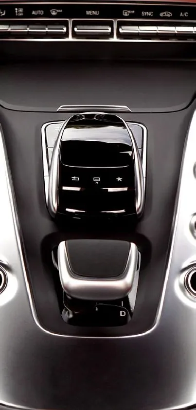 Close-up of a sleek car interior in black and red hues.