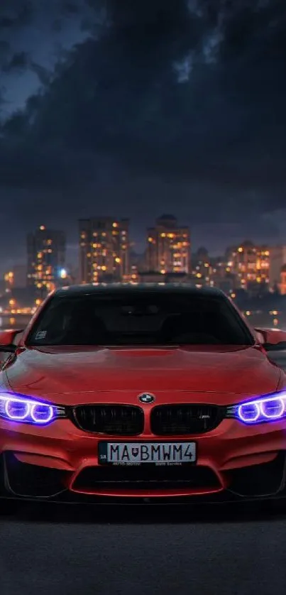 Red sports car with urban night skyline.