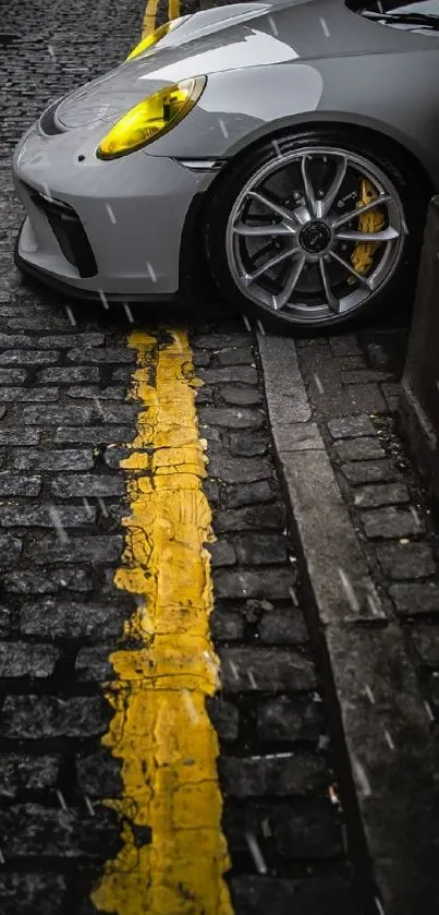 Sleek sports car on cobblestone street with yellow highlights.