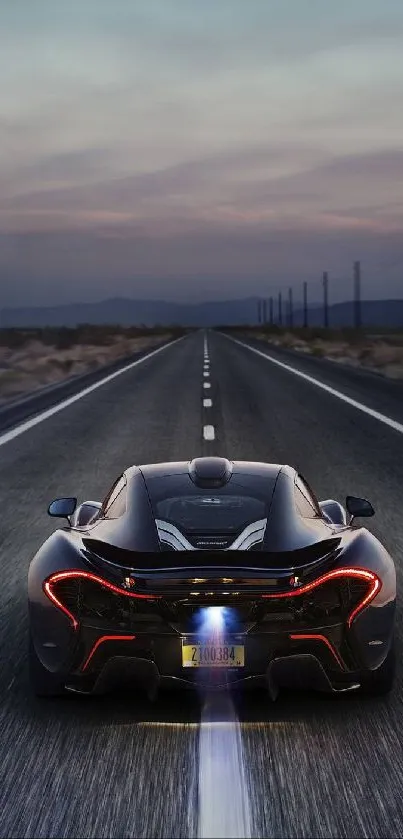 Sleek sports car driving on a deserted road at dusk.