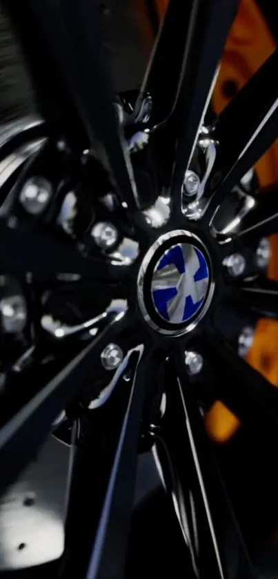 Close-up of sleek car wheel with metal alloy.