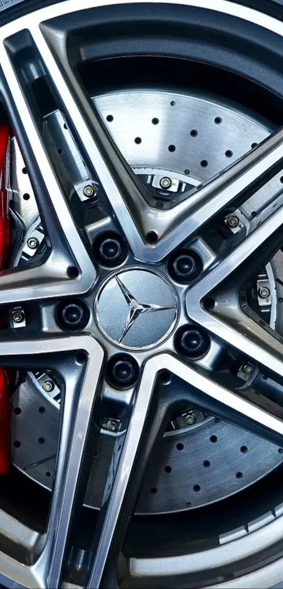 High-definition image of a sleek alloy car wheel with a red brake caliper.