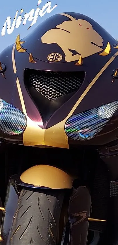 Custom motorcycle with sleek gold accents against a blue sky.