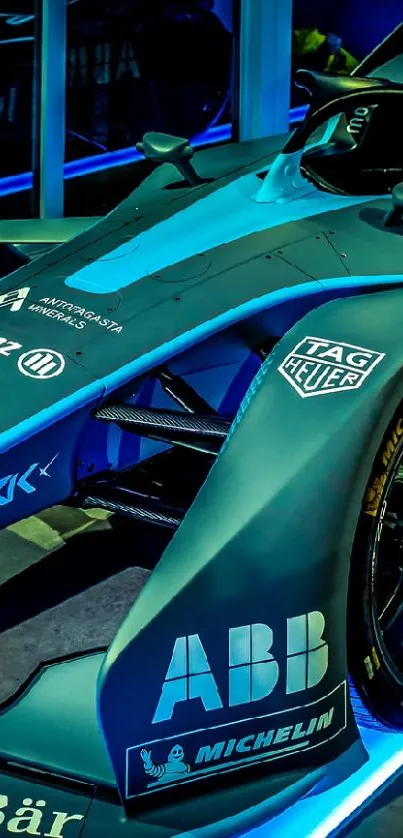 Sleek electric racing car with blue highlights.