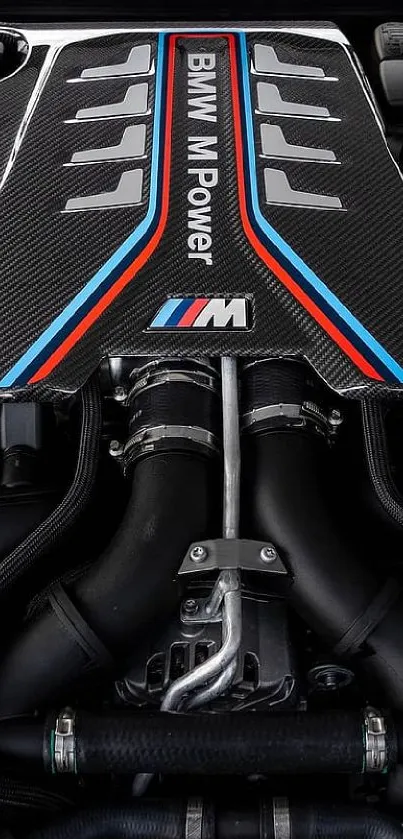 Detailed view of a BMW engine showcasing carbon fiber and sleek design.