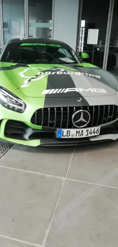 Green and silver Mercedes on a clean urban backdrop, showcasing a sleek design.