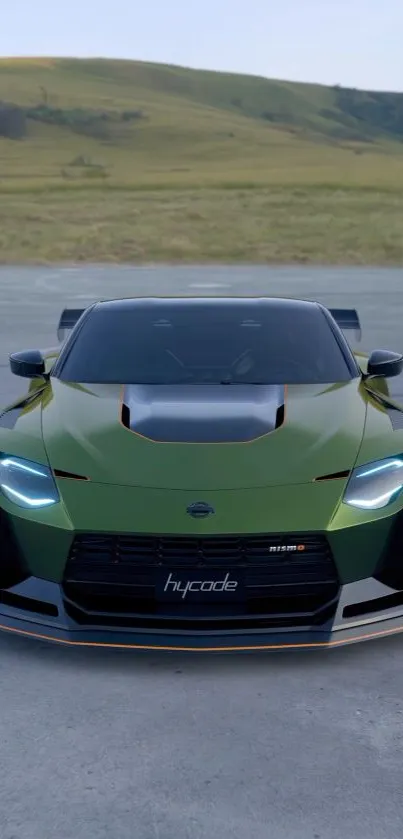 Green sports car with sleek design on open road background.