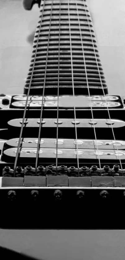 Monochrome electric guitar neck design wallpaper.