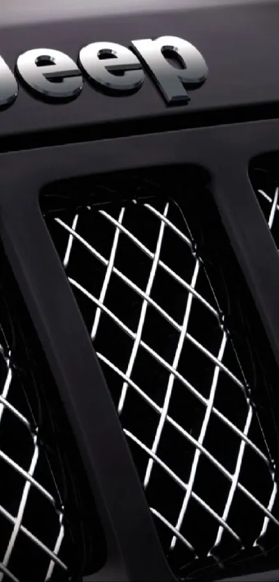 Sleek Jeep grille wallpaper in black with chrome accents.