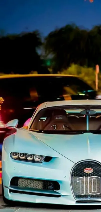 Blue luxury sports car with city lights.