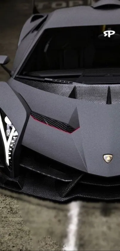 Sleek matte black sports car in a dimly lit garage.