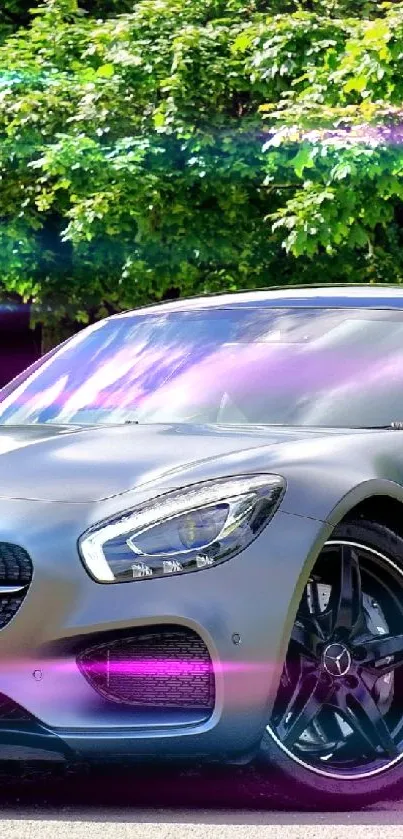 Sleek Mercedes sports car parked surrounded by lush green trees.