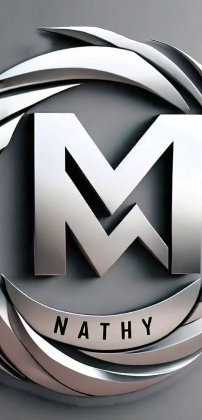 Sleek metallic M logo wallpaper with gray tones.