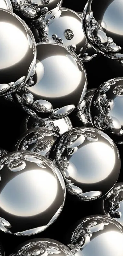 Sleek metallic orbs wallpaper with chrome spheres on a dark background.