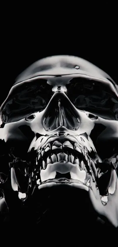 Sleek metallic skull art on black background.