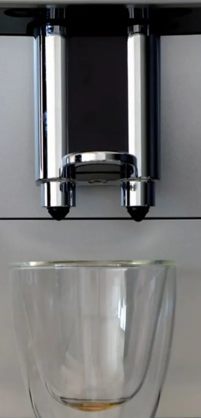 Sleek coffee machine with glass cup wallpaper.