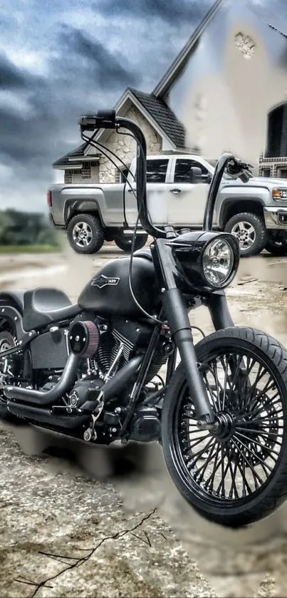 Black motorcycle with pickup truck and house in cloudy background.