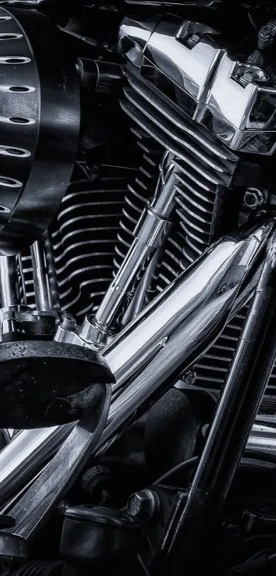 Close-up view of a detailed motorcycle engine in monochrome.