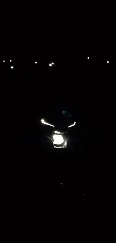 Mystical motorcycle illuminated in dark night scene.