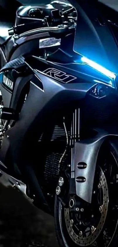 Futuristic blue motorcycle in nighttime setting with sleek design.