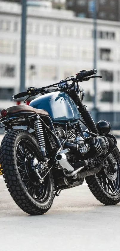 Sleek motorcycle against a city backdrop in an urban setting.