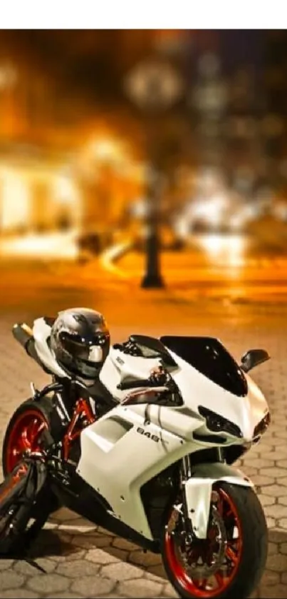 Sleek white sports bike with red wheels on an urban night street.