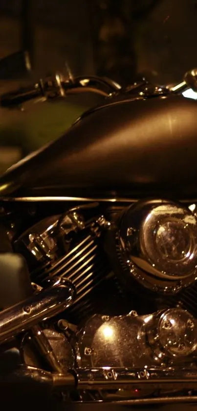 Sleek motorcycle at night with chrome highlights and dark background.