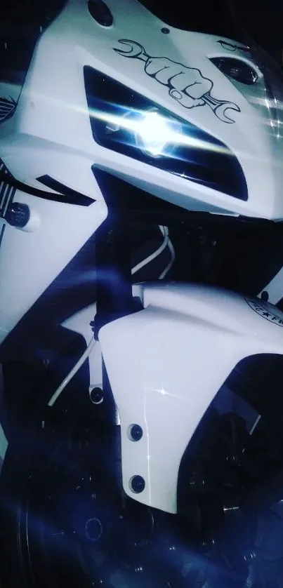 Sleek white motorcycle with graphic art design.