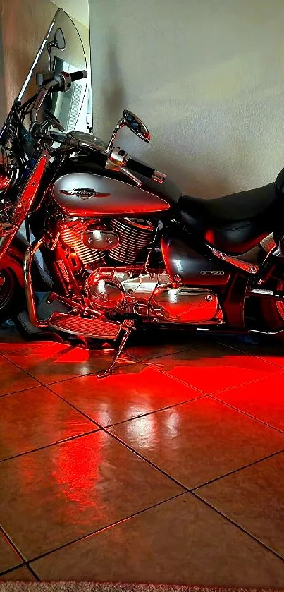 Motorcycle with red glow on tiles, sleek design.