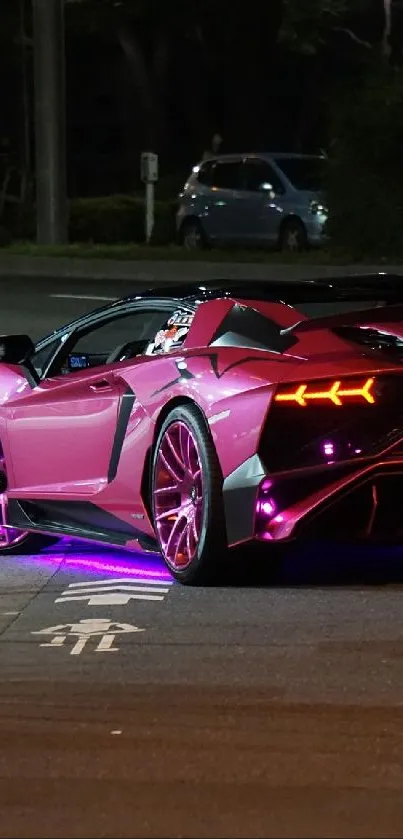 Sleek sports car with neon lights on a city street at night.