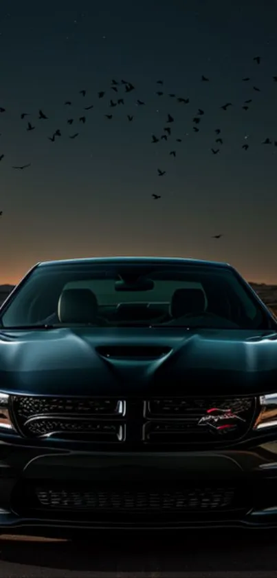 Sleek black car under a starry night sky with a full moon.