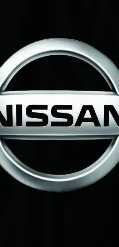 Nissan logo on sleek black background wallpaper.