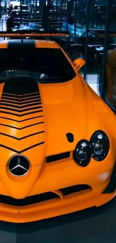 Orange luxury sports car parked inside a modern garage.