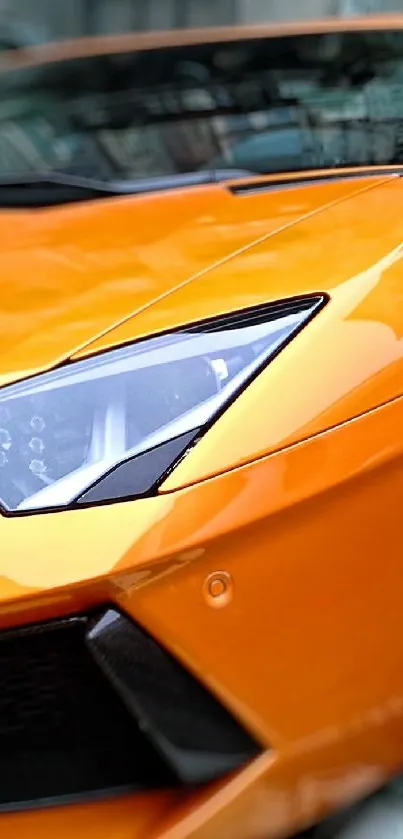 Vibrant orange sports car parked on the street, capturing elegance and speed.