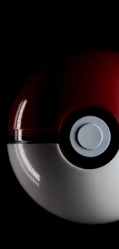 A sleek Pokeball on a dark background, ideal for mobile wallpaper.