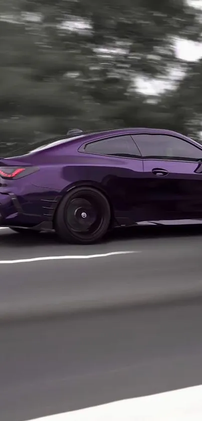 Sleek purple sports car driving fast on a road.