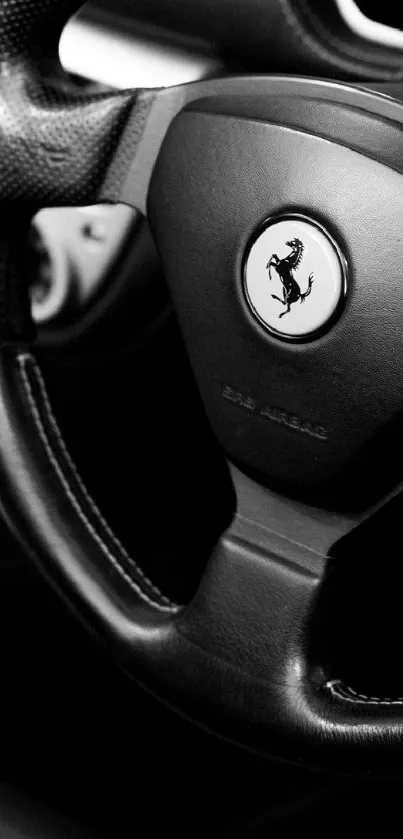 Black and white car interior with steering wheel and gear shift.
