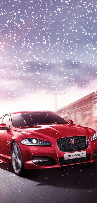 Sleek red sports car driving at speed with snowflakes in scenic mobile wallpaper.