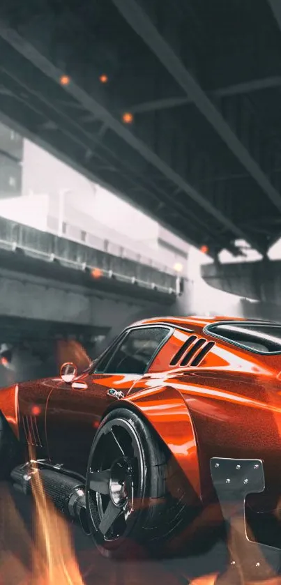 Sleek red sports car with flames under a city bridge.