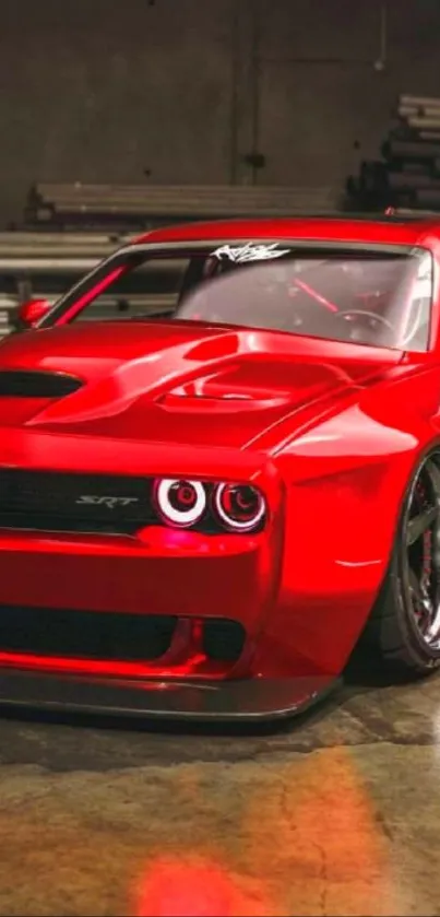 Sleek red car in a dimly lit garage with a sporty design.