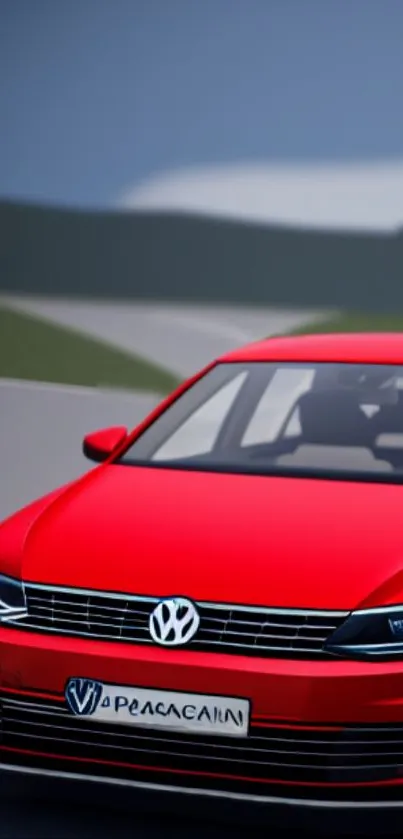 Sleek red car on a scenic road with blurred background.