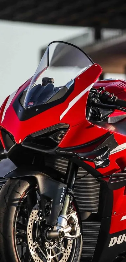 Sleek red Ducati motorcycle ready for a thrilling ride.