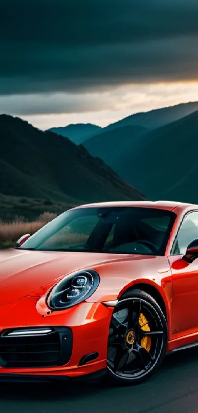 Sleek red sports car with sunset backdrop.