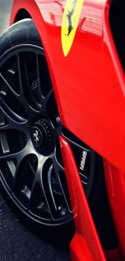 Dynamic red sports car with sleek design and bold wheel.