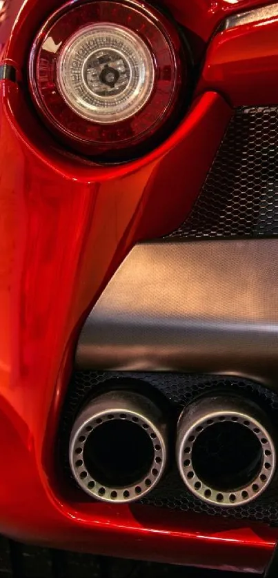 Sleek red sports car with detailed tailpipes and elegant design.