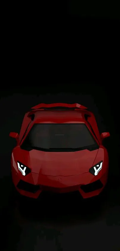 Sleek red sports car against a black backdrop.