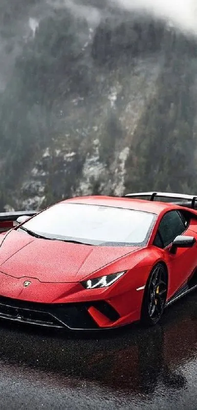 Red sports car on a misty mountain road wallpaper.