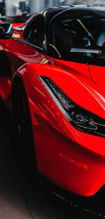 Red sports car with sleek design and shiny finish